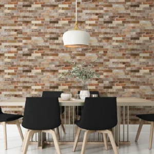 Brick look tiles in different color tones covering a dining room´s wall