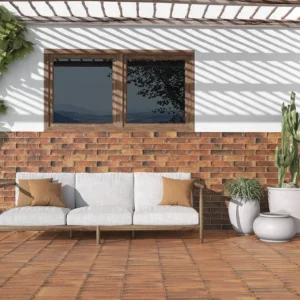 rustic style terrace with brick look tiles covering part of the facade