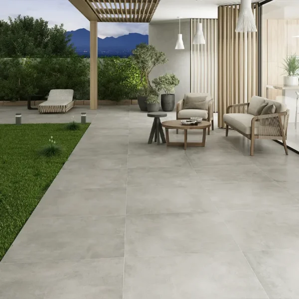 Through Body Porcelain Tile Manufacturing company´s catalogue picture showing a minimalist garden design 