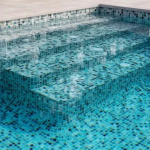 Picture showing a swimming pool  renovated with the material acquired from tile manufacturer