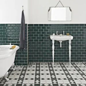 Subway tile manufacturers catalogue´s picture showing a very stylish bathroom decorated with dark green subway tiles