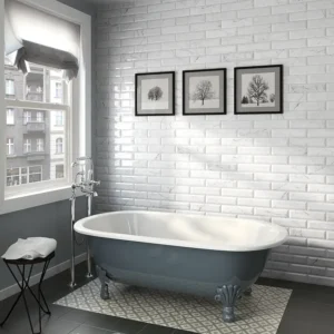 White aged subway tiles decorating an industrial style bathroom 