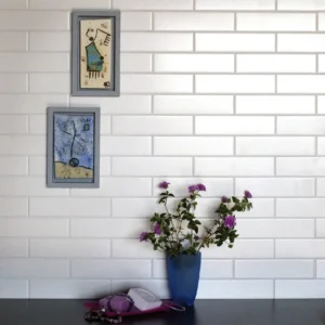 White subway tiles covering a wall
